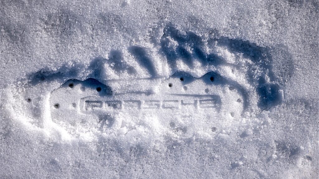 Porsche logo imprint created by Glide Soles custom snow traction outsole